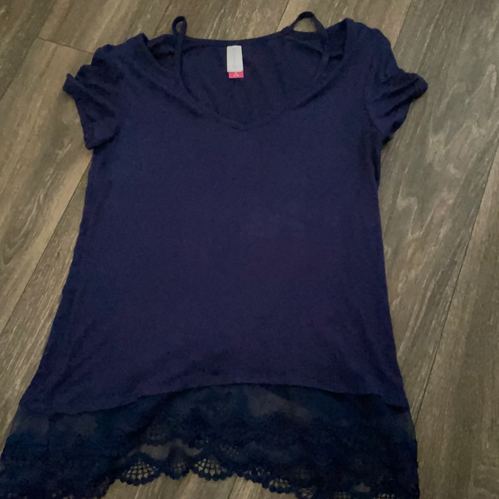 Navy blue top with lace on the bottom.